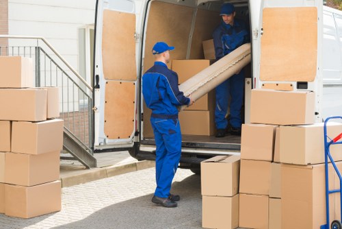 Man and van loading furniture for a local move in Barnehurst