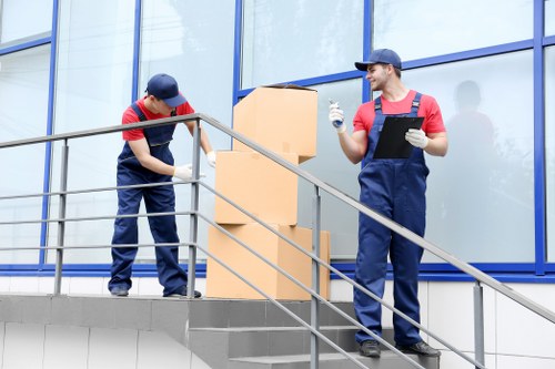 Van removal team preparing safely with protective equipment
