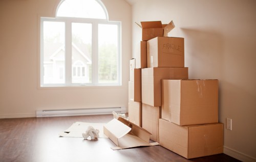 Packed boxes and furniture ready for a local house removal