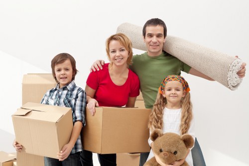 Careful loading of furniture and boxes for a house move in Barnehurst
