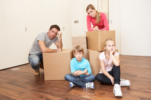 Careful loading of household furniture into a removals van