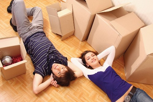 Careful loading of household items into a removal van
