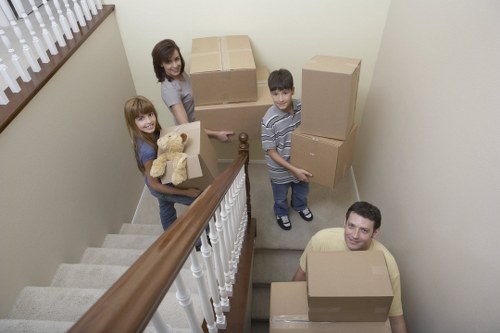Packed boxes and furniture loaded into a moving truck